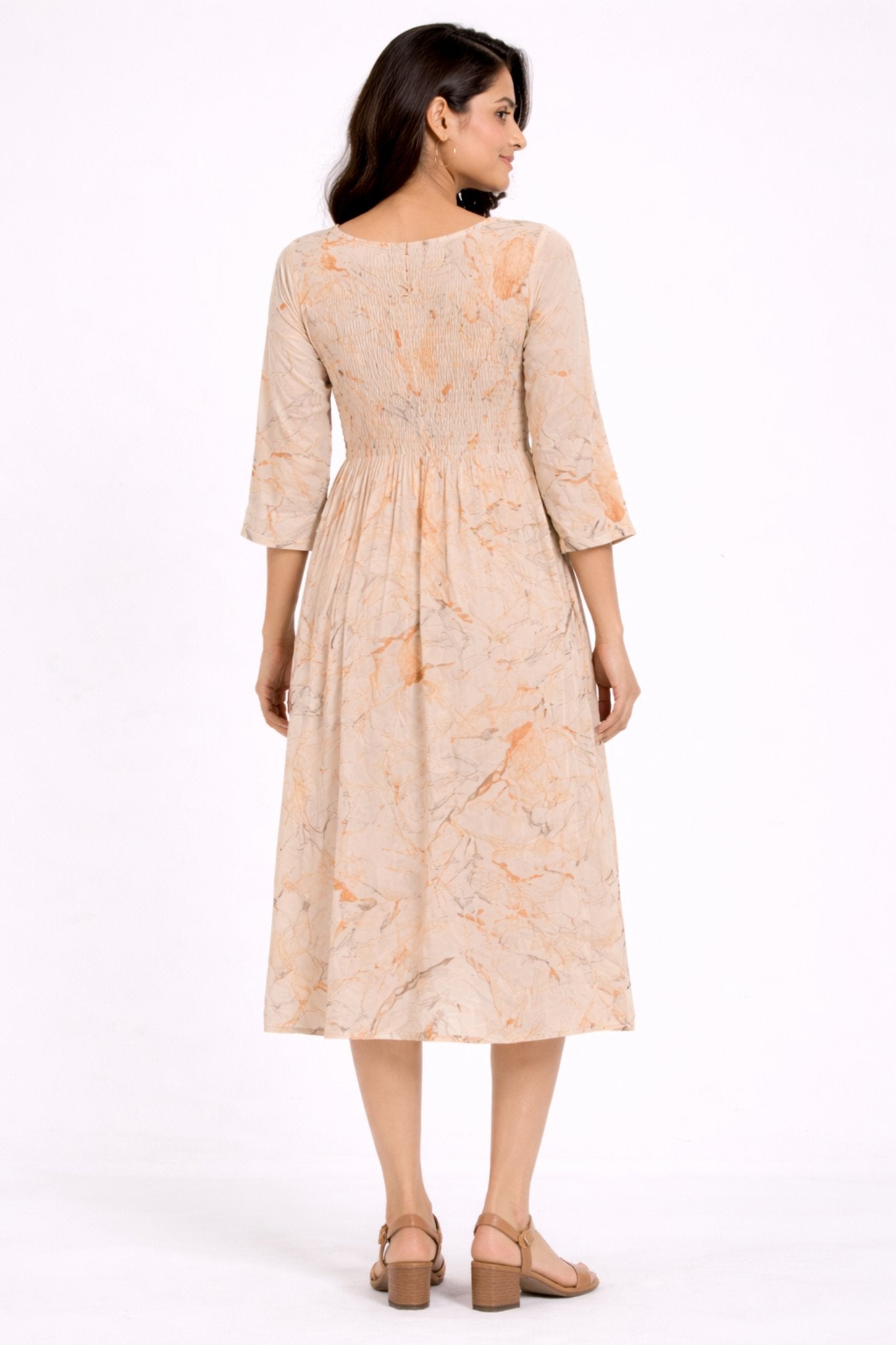 Women Beige Abstract Print Smocked Midi Dress