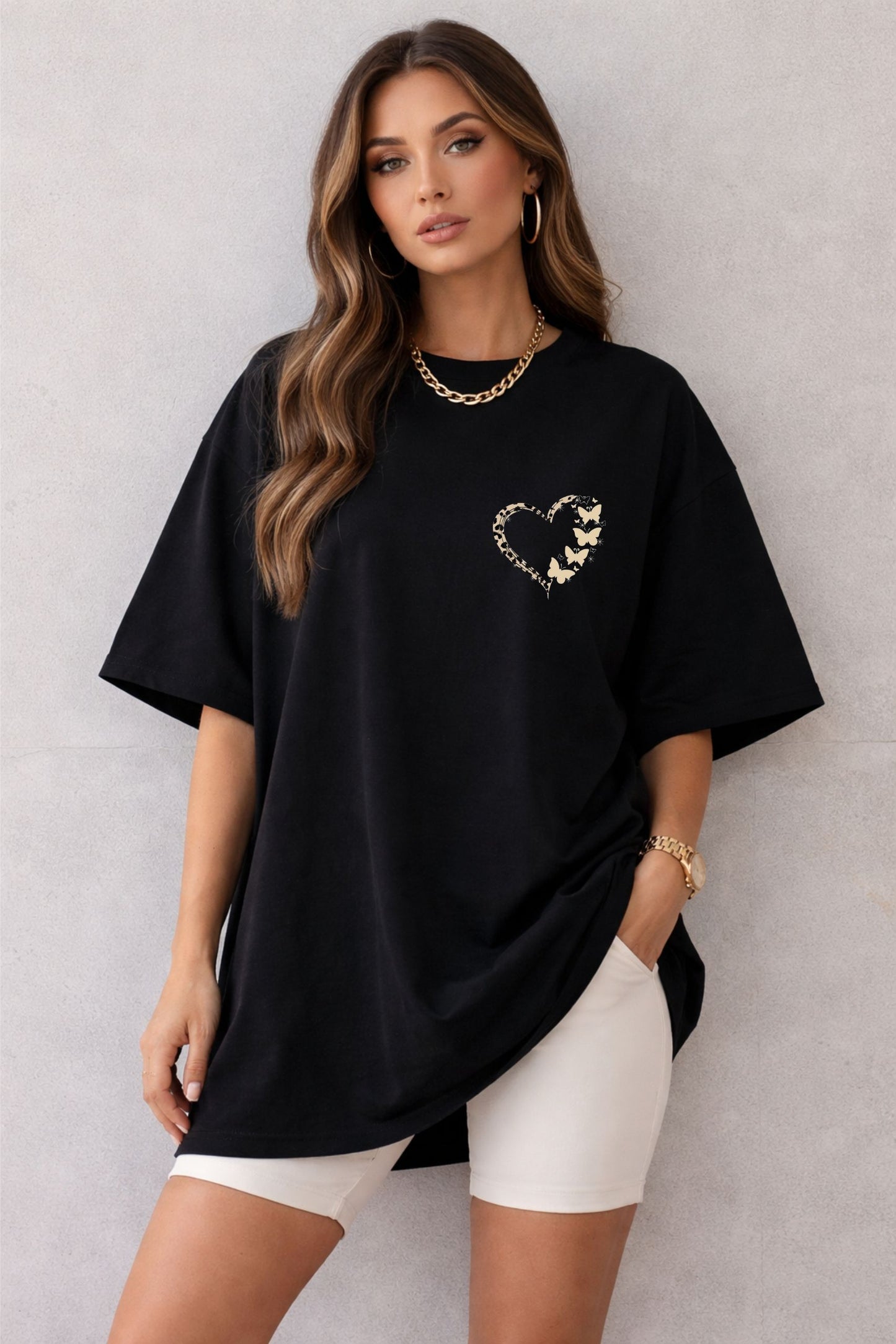 Women’s Black Oversized T-Shirt with Minimal Heart Print